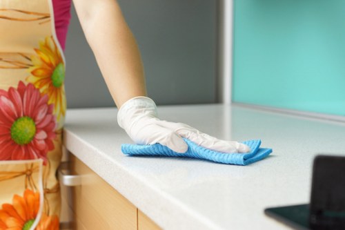 Carpet cleaning team preparing equipment safely before starting work